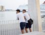 two men of a friend on the city promenade in Malaga two men of a friend on the city promenade in Malaga